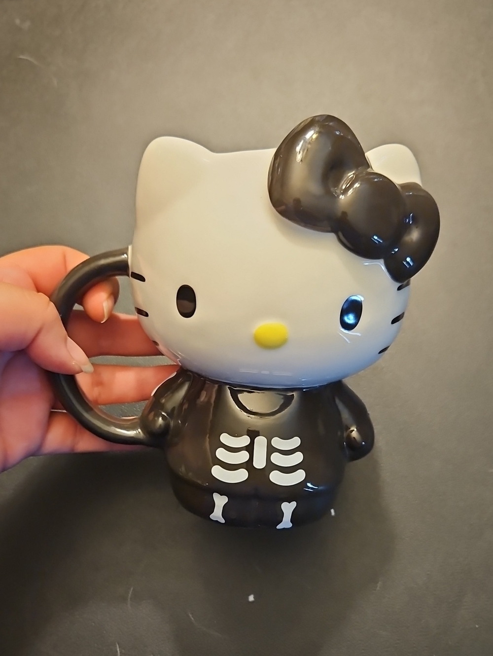 Hello Kitty Black & White Skeleton Mug with Yellow Nose